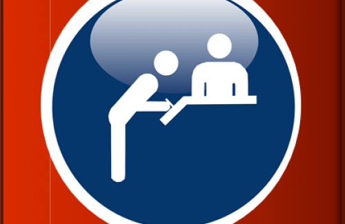 Icon of person signing in at desk