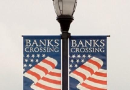 Banks Crossing American flag on light post